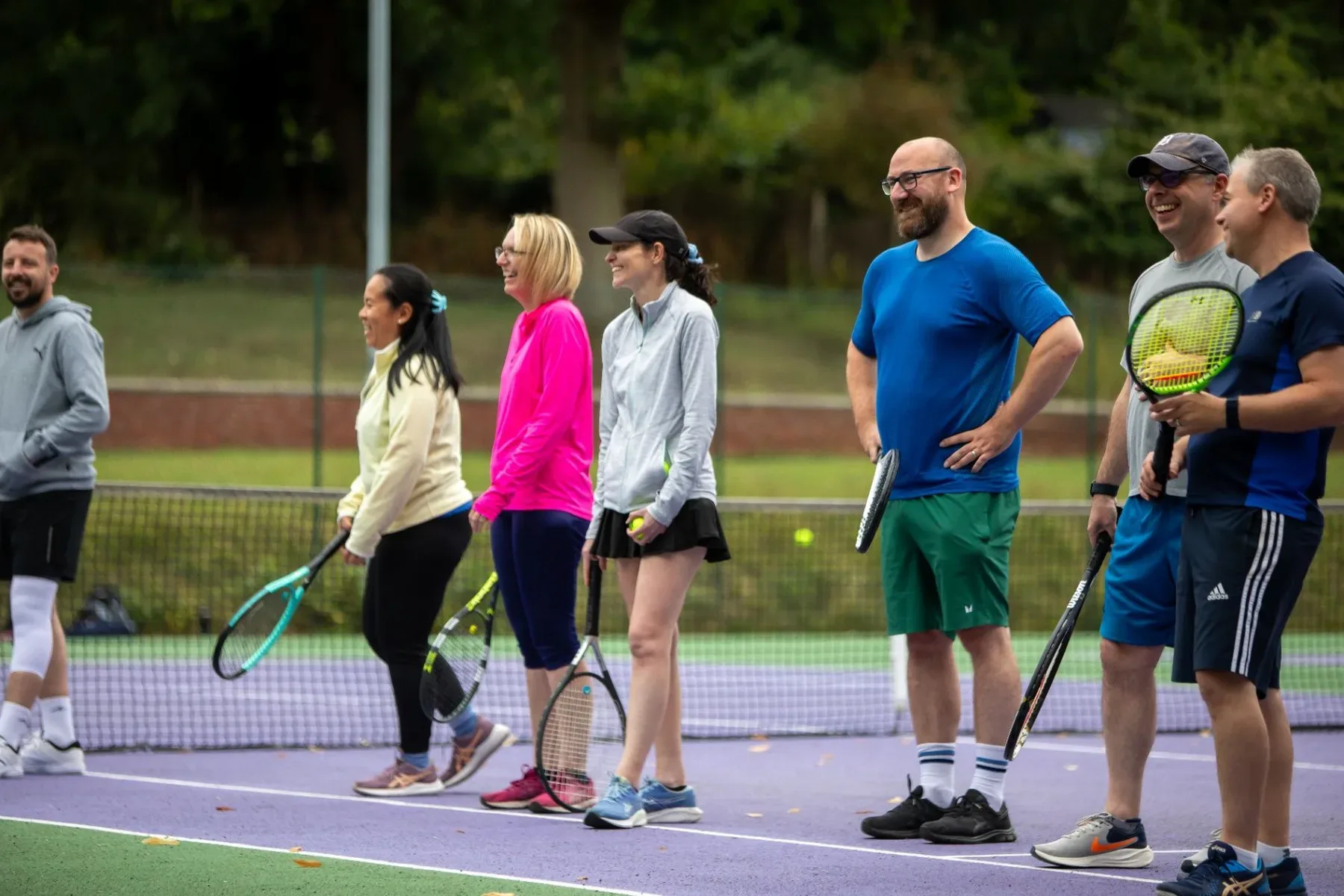 An adult group session gathered at the net